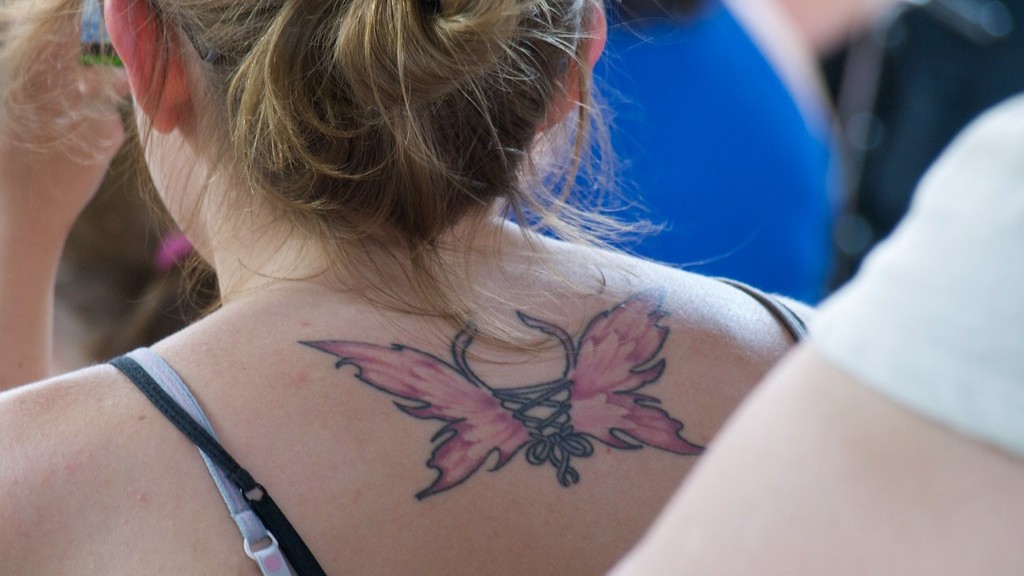 Verspreidt tattoo-inkt zich in de loop van de tijd?